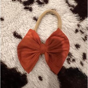 Orange nylon bow